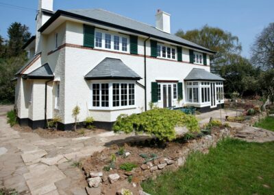 White Auminium windows Into Existing Heritage Cross