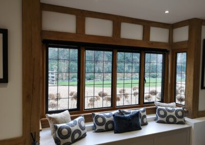 black aluminium replacement windows in tudor house